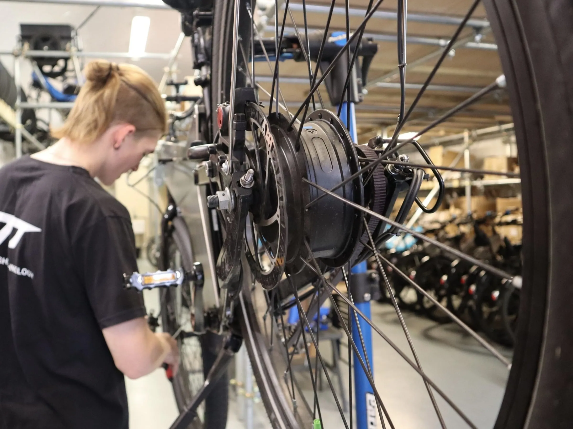 ETT technician servicing a Trayser wheel in the workshop
